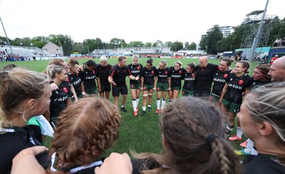 270822 - Canada Women v Wales Women, Summer 15’s World Cup Warm up match - Wales players huddle at the end of the match