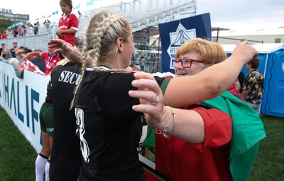 270822 - Canada Women v Wales Women, Summer 15’s World Cup Warm up match - Carys Williams-Morris of Wales embraces mum Bethan at the end of the match