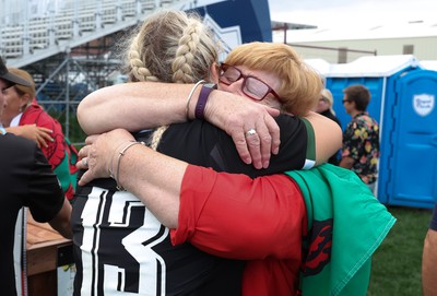 270822 - Canada Women v Wales Women, Summer 15’s World Cup Warm up match - Carys Williams-Morris of Wales embraces mum Bethan at the end of the match