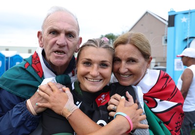 270822 - Canada Women v Wales Women, Summer 15’s World Cup Warm up match - Lowri Norkett of Wales with parents Caroline and Kim at the end of the match