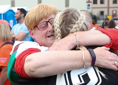 270822 - Canada Women v Wales Women, Summer 15’s World Cup Warm up match - Carys Williams-Morris of Wales embraces mum Bethan at the end of the match