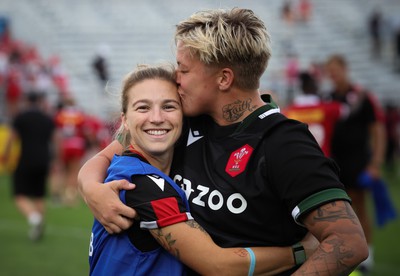 270822 - Canada Women v Wales Women, Summer 15’s World Cup Warm up match - Keira Bevan and Donna Rose of Wales at the end of the match