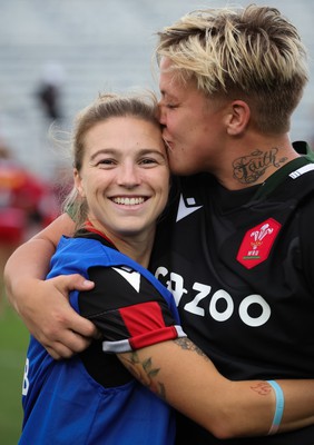 270822 - Canada Women v Wales Women, Summer 15’s World Cup Warm up match - Keira Bevan and Donna Rose of Wales at the end of the match