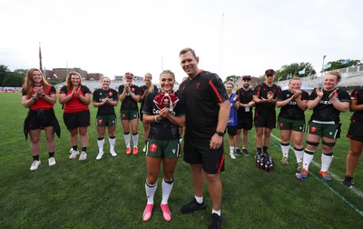 270822 - Canada Women v Wales Women, Summer 15’s World Cup Warm up match - Head coach Ioan Cunningham makes first cap presentation to Lowri Norkett of Wales