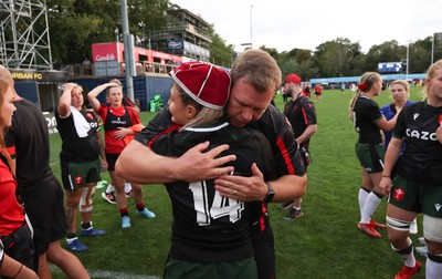 270822 - Canada Women v Wales Women, Summer 15’s World Cup Warm up match - Head coach Ioan Cunningham congratulates Lowri Norkett of Wales on her first cap