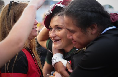 270822 - Canada Women v Wales Women, Summer 15’s World Cup Warm up match - Lowri Norkett of Wales is congratulated on her first cap