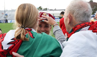 270822 - Canada Women v Wales Women, Summer 15’s World Cup Warm up match - Lowri Norkett is congratulated on her first cap by parents Caroline and Kim 