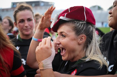 270822 - Canada Women v Wales Women, Summer 15’s World Cup Warm up match - Lowri Norkett of Wales is congratulated on her first cap