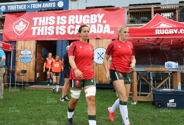 270822 - Canada Women v Wales Women, Summer 15’s World Cup Warm up match - Sioned Harries of Wales and Carys Williams-Morris of Wales walk out for warm up