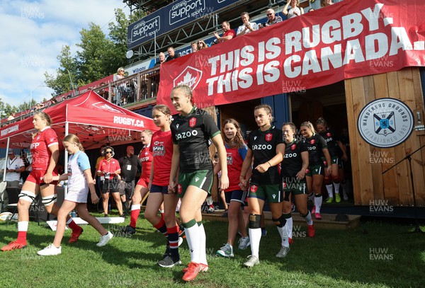 270822 - Canada Women v Wales Women, Summer 15’s World Cup Warm up match - Hannah Jones of Wales leads out the Welsh team