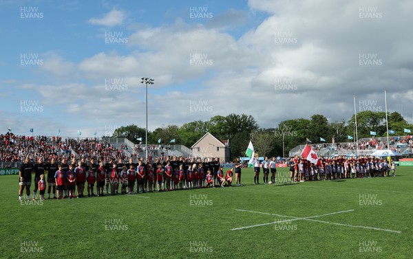 270822 - Canada Women v Wales Women, Summer 15’s World Cup Warm up match - The Welsh and Canadian teams line up for the anthems