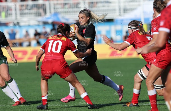 270822 - Canada Women v Wales Women, Summer 15’s World Cup Warm up match - Lowri Norkett of Wales is tackled by Taylor Perry of Canada