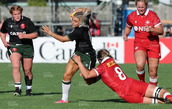 270822 - Canada Women v Wales Women, Summer 15’s World Cup Warm up match - Lowri Norkett of Wales takes on Sophie de Goede of Canada