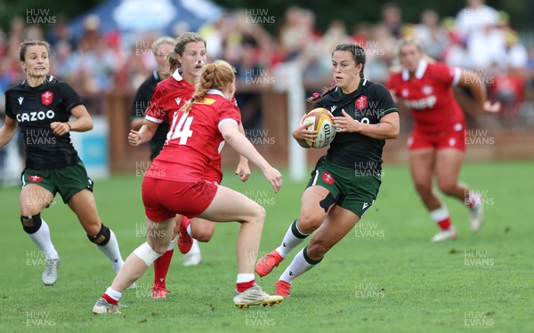 270822 - Canada Women v Wales Women, Summer 15’s World Cup Warm up match - Ffion Lewis of Wales takes on Paige Farries of Canada