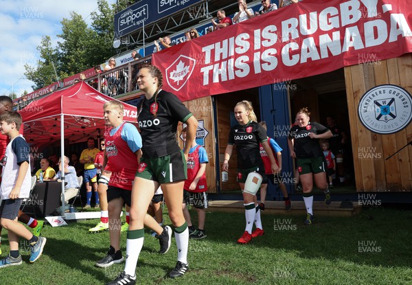 270822 - Canada Women v Wales Women, Summer 15’s World Cup Warm up match - Caitlin Lewis of Wales walks out for the start of the match