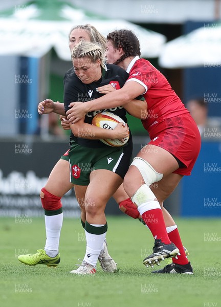 270822 - Canada Women v Wales Women, Summer 15’s World Cup Warm up match - Kelsey Jones of Wales is tackled