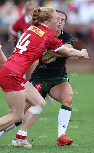 270822 - Canada Women v Wales Women, Summer 15’s World Cup Warm up match - Ffion Lewis of Wales takes on Paige Farries of Canada