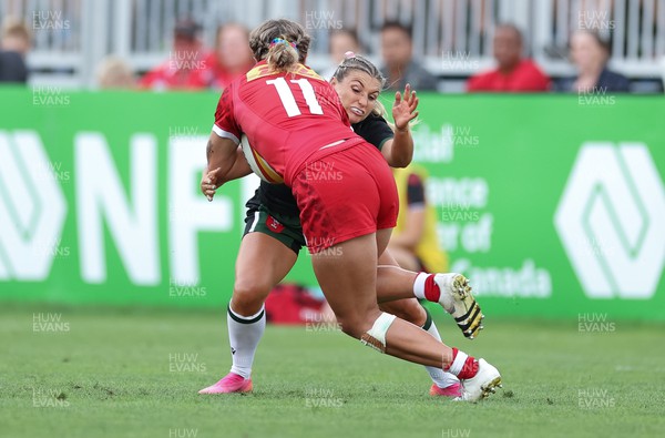 270822 - Canada Women v Wales Women, Summer 15’s World Cup Warm up match - Lowri Norkett of Wales tackles Maddy Grant of Canada