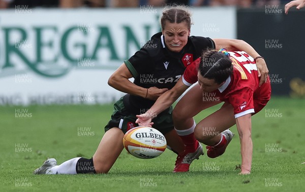 270822 - Canada Women v Wales Women, Summer 15’s World Cup Warm up match - Jasmine Joyce of Wales and Elissa Alarie of Canada compete for the ball