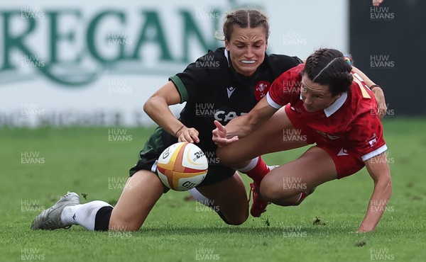 270822 - Canada Women v Wales Women, Summer 15’s World Cup Warm up match - Jasmine Joyce of Wales and Elissa Alarie of Canada compete for the ball