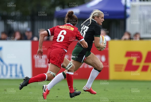 270822 - Canada Women v Wales Women, Summer 15’s World Cup Warm up match - Carys Williams-Morris of Wales gets away from Fabiola Forteza of Canada