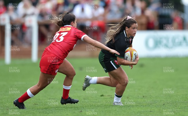 270822 - Canada Women v Wales Women, Summer 15’s World Cup Warm up match - Kayleigh Powell of Wales takes on Julia Schell of Canada 