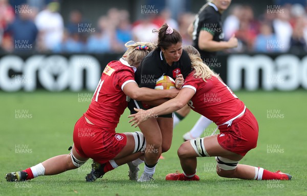270822 - Canada Women v Wales Women, Summer 15’s World Cup Warm up match - Kayleigh Powell of Wales is tackled