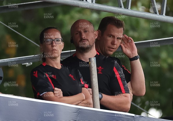 270822 - Canada Women v Wales Women, Summer 15’s World Cup Warm up match - Wales coaches Louise Jones, Mike Hill and Head Coach Ioan Cunningham watch the match