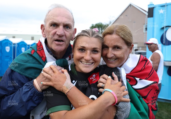 270822 - Canada Women v Wales Women, Summer 15’s World Cup Warm up match - Lowri Norkett of Wales with parents Caroline and Kim at the end of the match