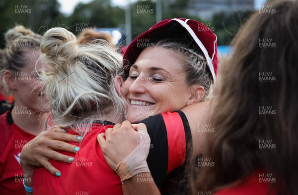270822 - Canada Women v Wales Women, Summer 15’s World Cup Warm up match - Lowri Norkett of Wales is congratulated on her first cap