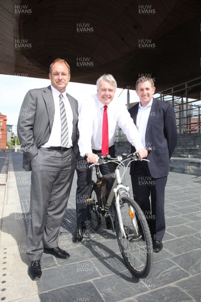 25.05.11 -  Captains California Bike Ride 2012 Launch, Senedd -  First Minister Carwyn Jones with Mike Hall (left) and Jonathan Davies at the launch of The Captains California Bike Ride in aid of the Stepping Stones Appeal which is raising money for lung cancer research at Velindre Cancer Centre. 