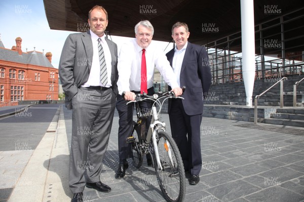 25.05.11 -  Captains California Bike Ride 2012 Launch, Senedd -  First Minister Carwyn Jones with Mike Hall (left) and Jonathan Davies at the launch of The Captains California Bike Ride in aid of the Stepping Stones Appeal which is raising money for lung cancer research at Velindre Cancer Centre. 