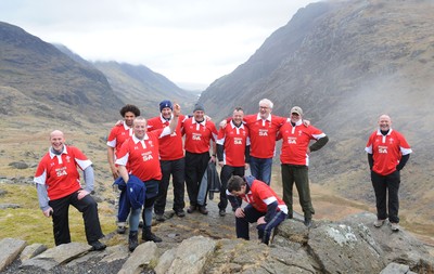 24.03.10 -  Brains Captains Kilimanjaro Climb - (L-R)Paul Thorburn, Colin Charvis, Garin Jenkins, Emyr Lewis, Mike Hall, Bleddyn Bowen, Eddie Butler, Robert Jones, Robert Norster and Ieuan Evans after a climb up Snowdon in training for the Brains Captains Kilimanjaro Climb. 