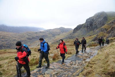 24.03.10 -  Brains Captains Kilimanjaro Climb - Media Wales reporter Madeleine Brindley (red) during a climb up Snowdon in preparation for the Brains Captains Kilimanjaro Climb. 