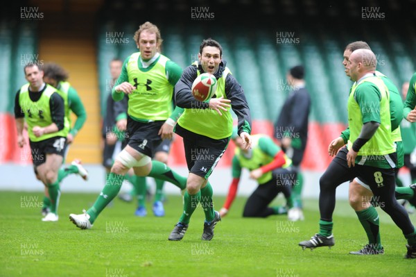 12.02.10 Wales rugby training... Stephen Jones releases the ball. 