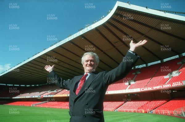 151096 -  Welsh Rugby Union Treasurer Glanmor Griffiths with Cardiff Arms Park "North Stand" which is now to stay under revised plans for the new stadium which will be named Millennium Stadium (Later renamed Principality Stadium)