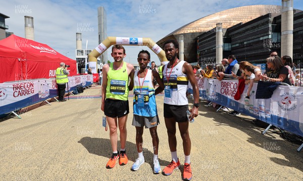 220522 - Brecon Carreg Cardiff Bay Run 10k - Omar Ahmed, centre, winner of the race with Dewi Griffiths, 2nd and Abed Teweldebrhan, third