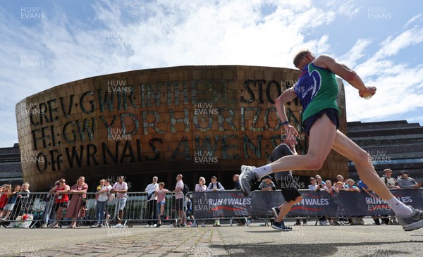 220522 - Brecon Carreg Cardiff Bay Run 10k - Runners come home to finish the course