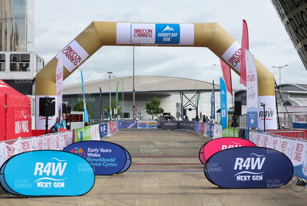 220522 - Brecon Carreg Cardiff Bay Run 10k - A general view of the finish area and event village