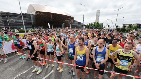 220522 - Brecon Carreg Cardiff Bay Run 10k - Competitors head off at the start of the event