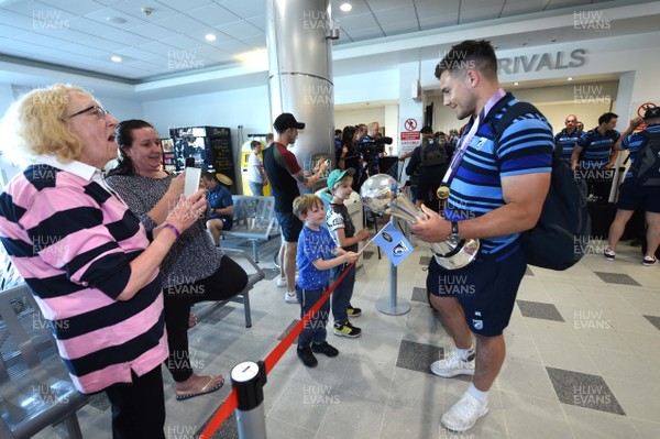 130518 - Cardiff Blues Arrival - Ellis Jenkins arrives at Cardiff Airport with the European Rugby Challenge Cup