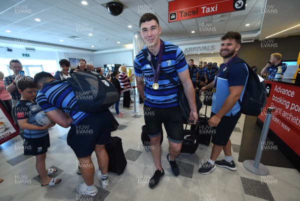130518 - Cardiff Blues Arrival - See Davies arrives at Cardiff Airport after winning the European Rugby Challenge Cup