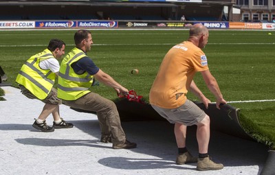 250713 - Cardiff Blues Pitch Renovation -Work continues at Arms Park on Cardiff Blues pitch as the new artificial pitch is laid down by workers