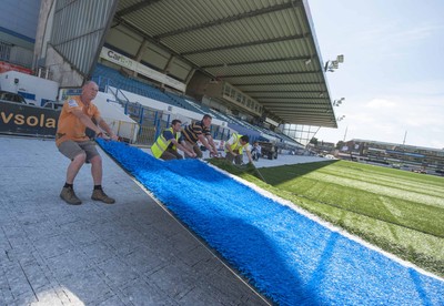 250713 - Cardiff Blues Pitch Renovation -Work continues at Arms Park on Cardiff Blues pitch as the new artificial pitch is laid down by workers