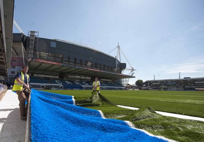 250713 - Cardiff Blues Pitch Renovation -Work continues at Arms Park on Cardiff Blues pitch as the new artificial pitch is laid down by workers