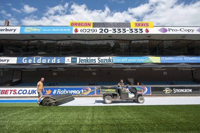 250713 - Cardiff Blues Pitch Renovation -Work continues at Arms Park on Cardiff Blues pitch as the new artificial pitch is laid down by workers