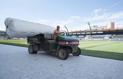 250713 - Cardiff Blues Pitch Renovation -Work continues at Arms Park on Cardiff Blues pitch as the new artificial pitch is laid down by workers