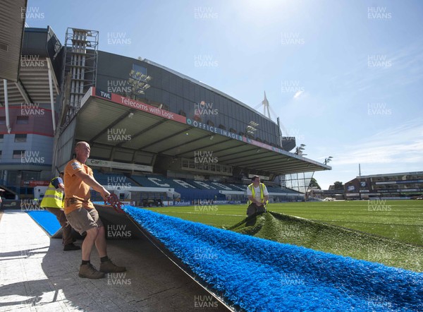 250713 - Cardiff Blues Pitch Renovation -Work continues at Arms Park on Cardiff Blues pitch as the new artificial pitch is laid down by workers