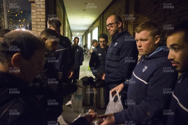 071215 - Cardiff Blues players feed the homeless on Charles Street, Cardiff -