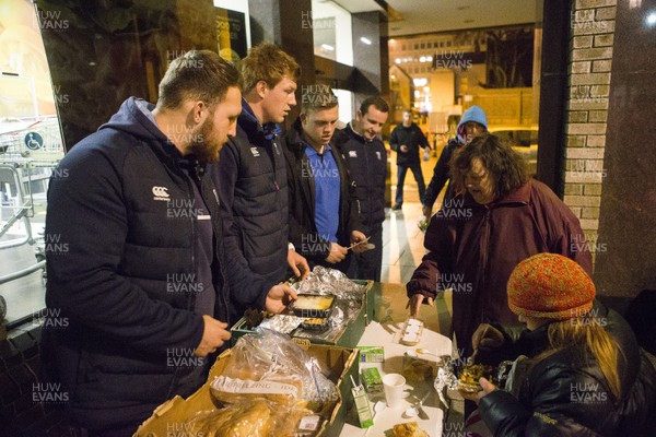 071215 - Cardiff Blues players feed the homeless on Charles Street, Cardiff -